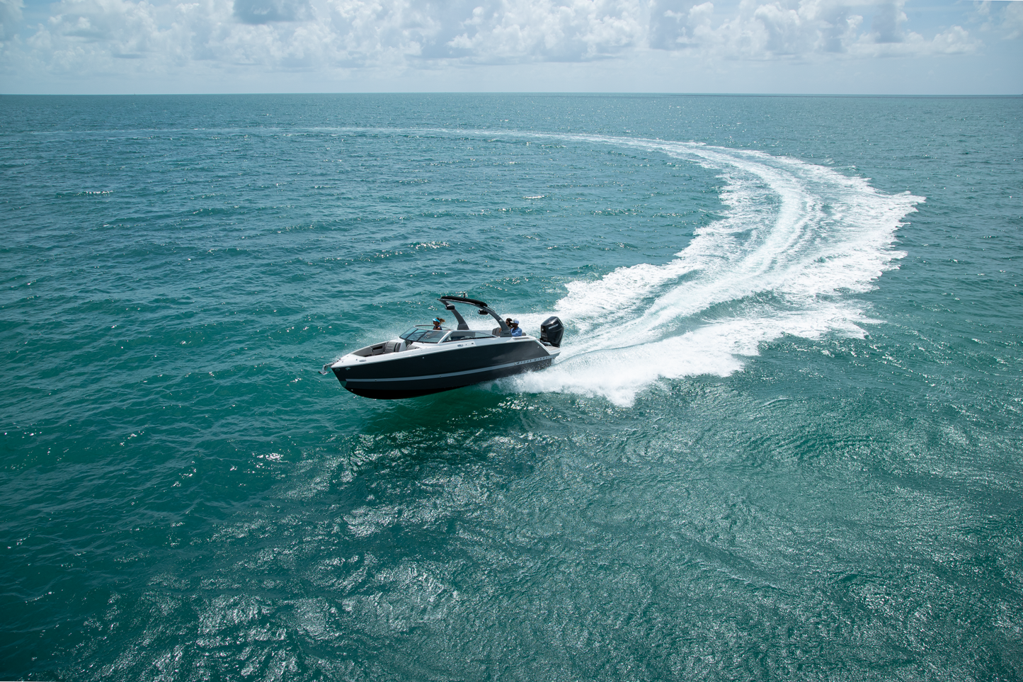 Four Winns H6 leaving a trail on the water available at Lark Marine, Northern Michigan